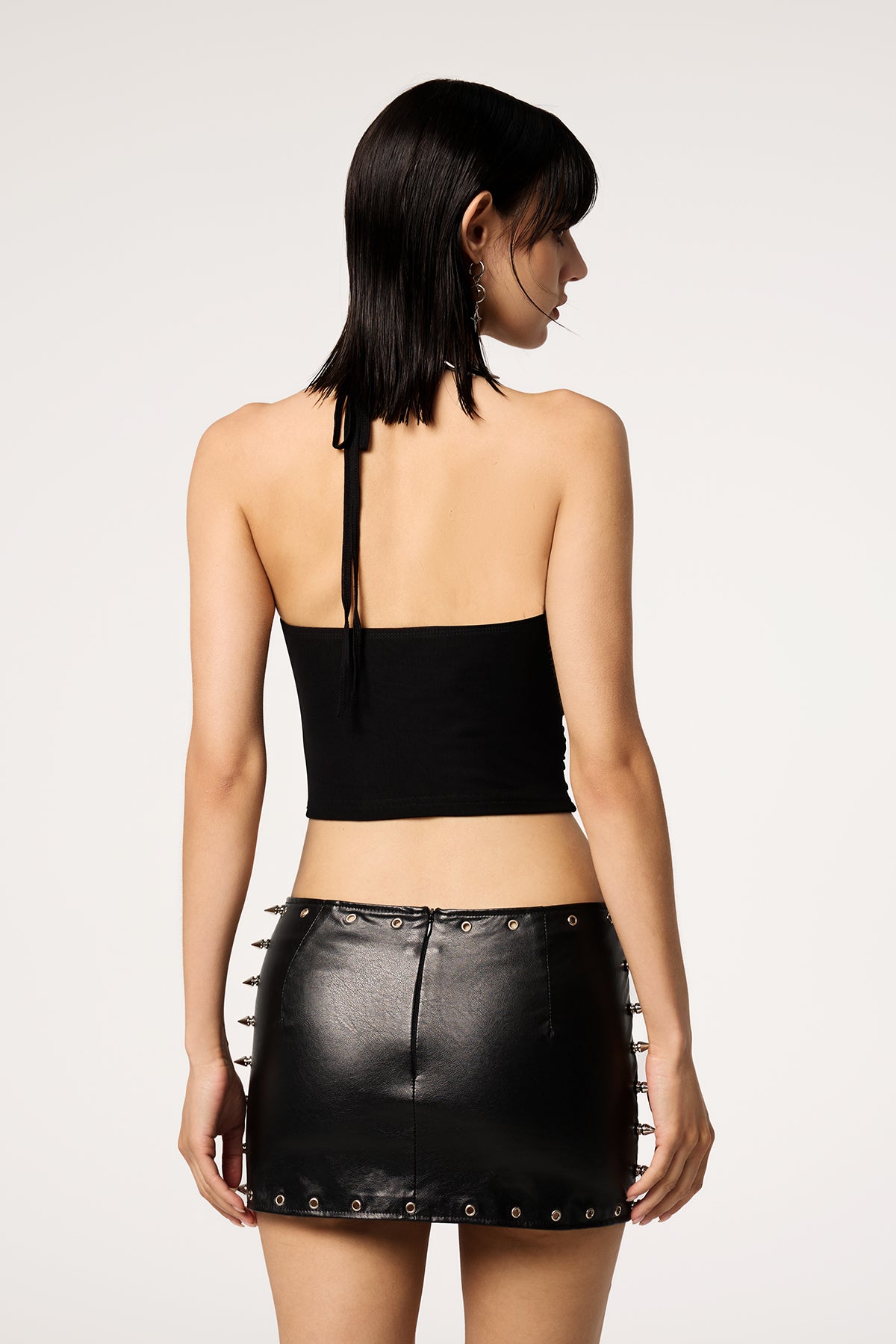 Deep Slash Studded Low Rise Leather Mini Skirt
