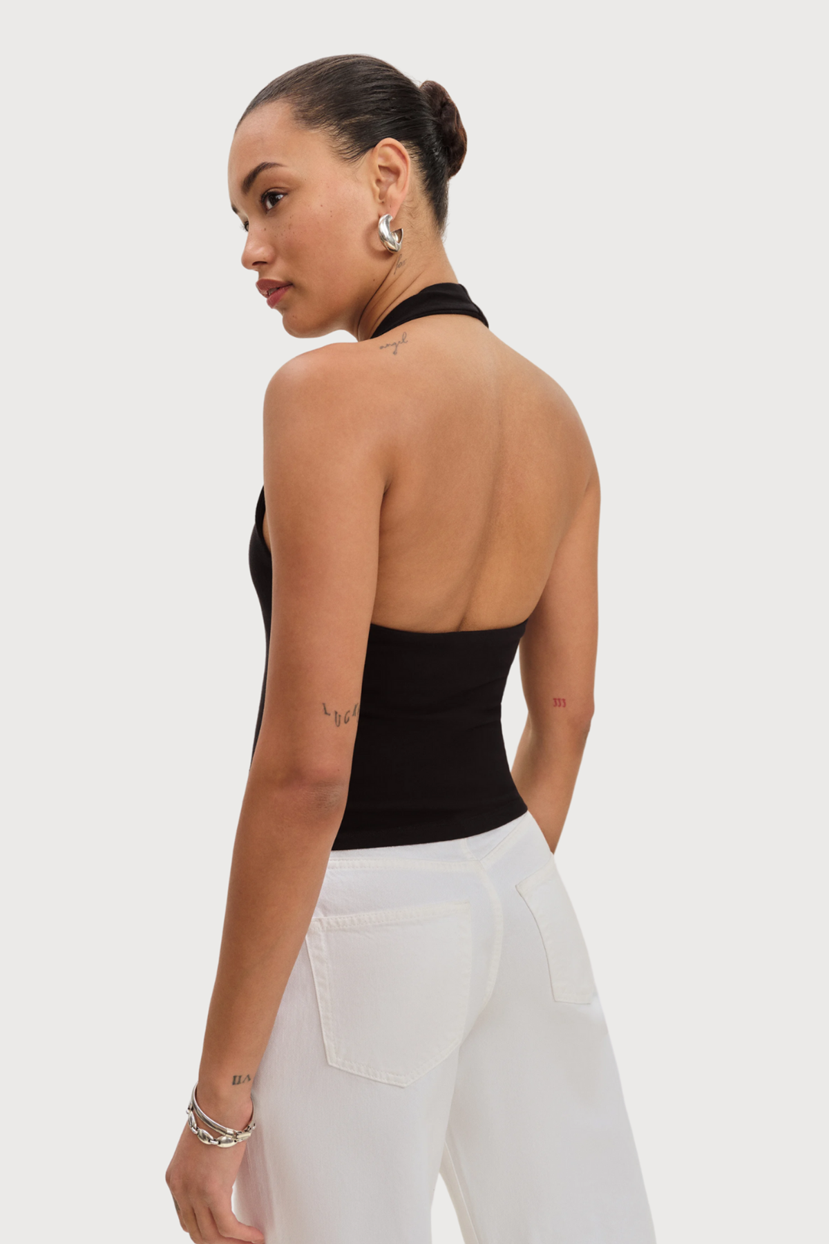 Exposed Spine Cutout Metal Sleeveless Top