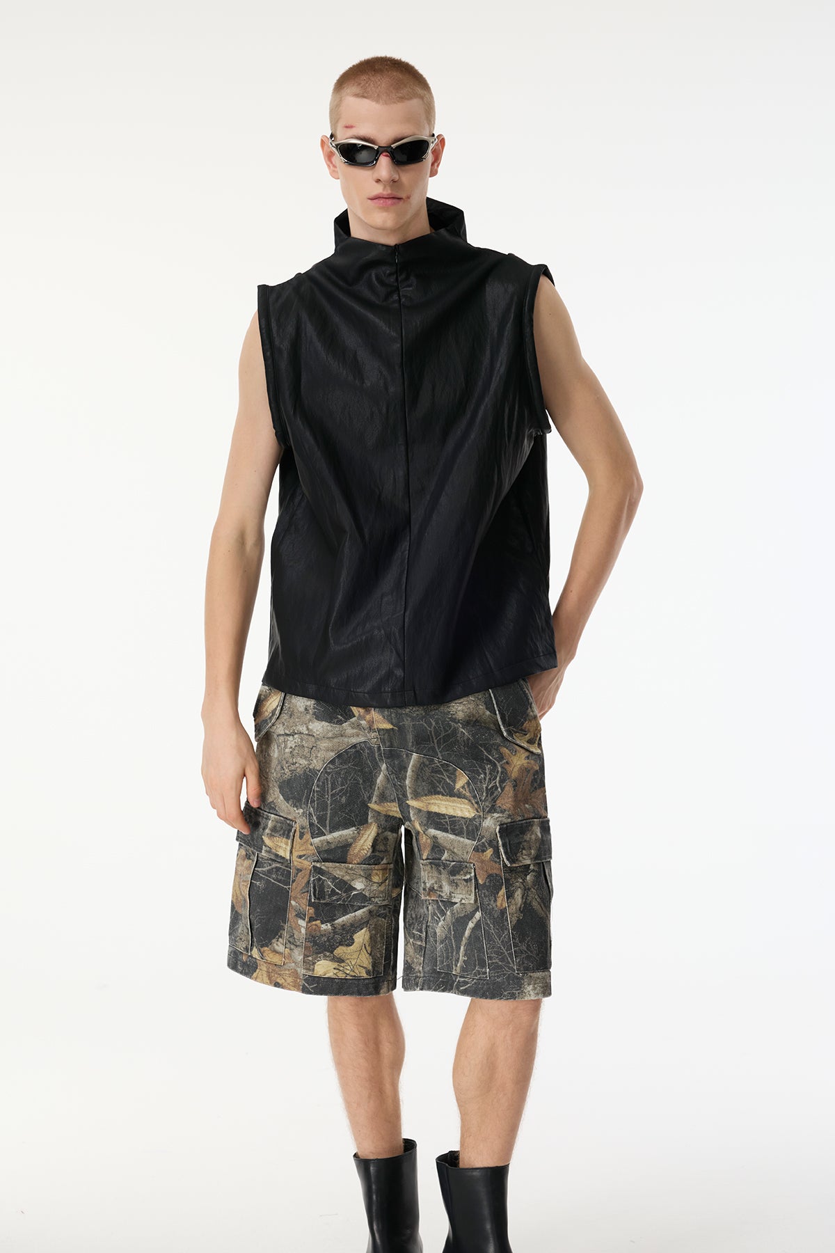 Tight Frame Sleeveless Leather Top