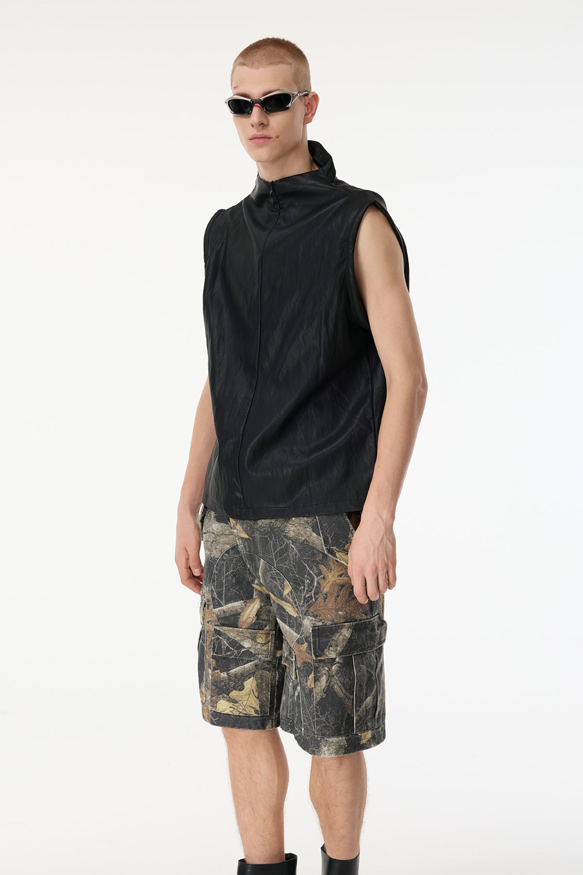 Tight Frame Sleeveless Leather Top