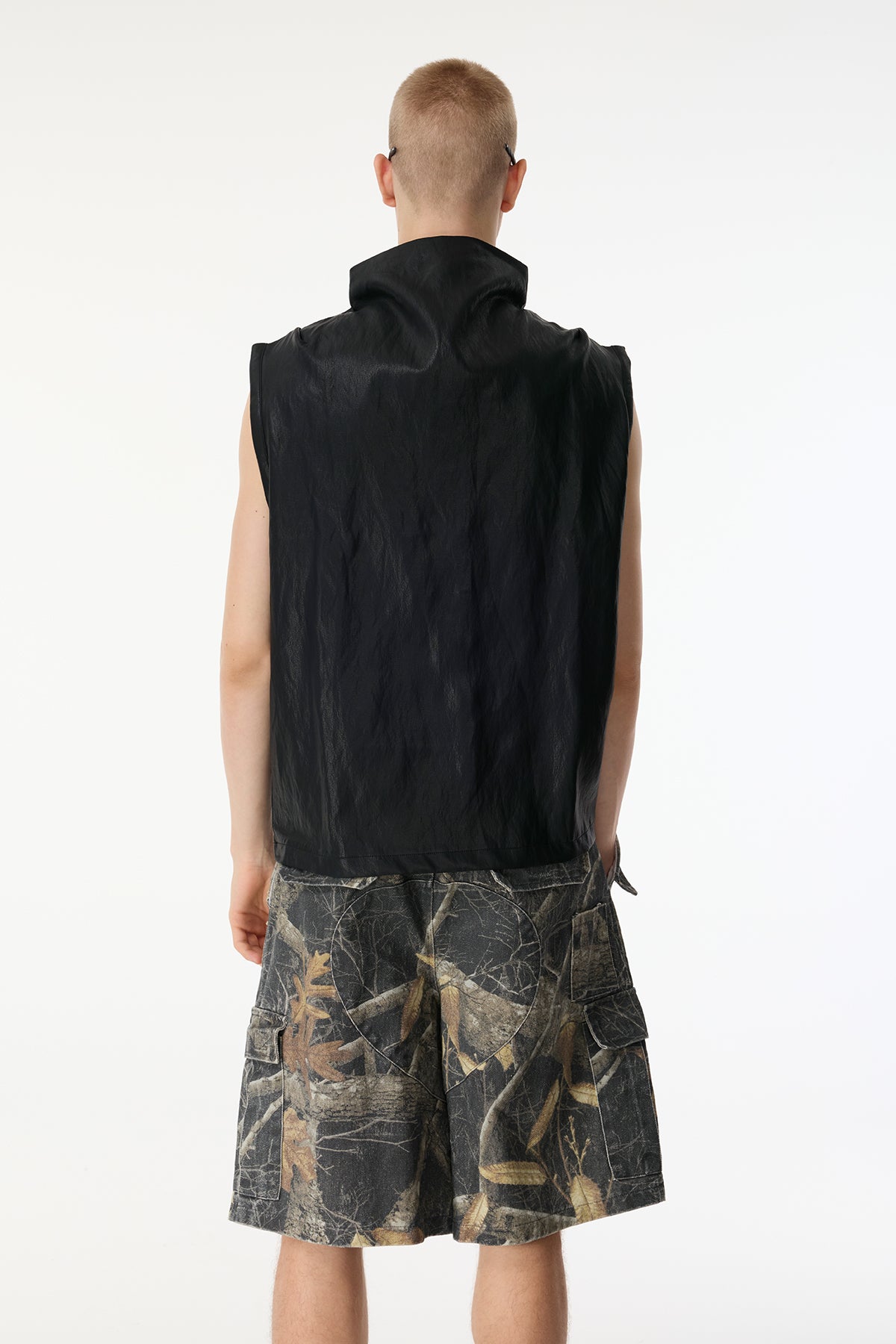 Tight Frame Sleeveless Leather Top