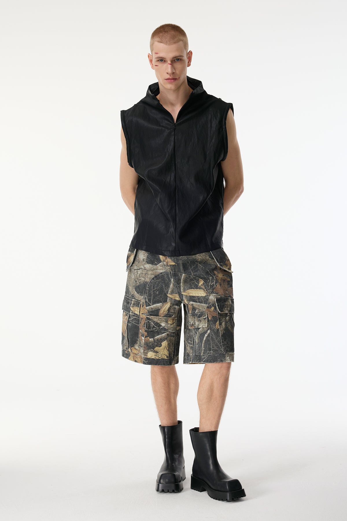 Tight Frame Sleeveless Leather Top